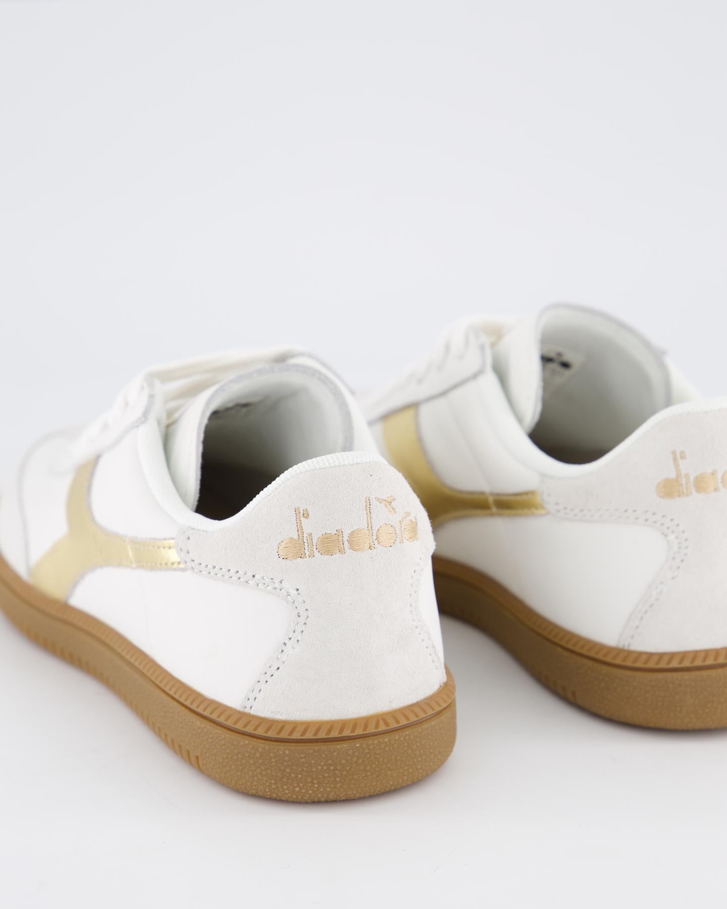 Dames Trainer Dore